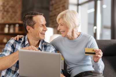 a man and woman shopping online
